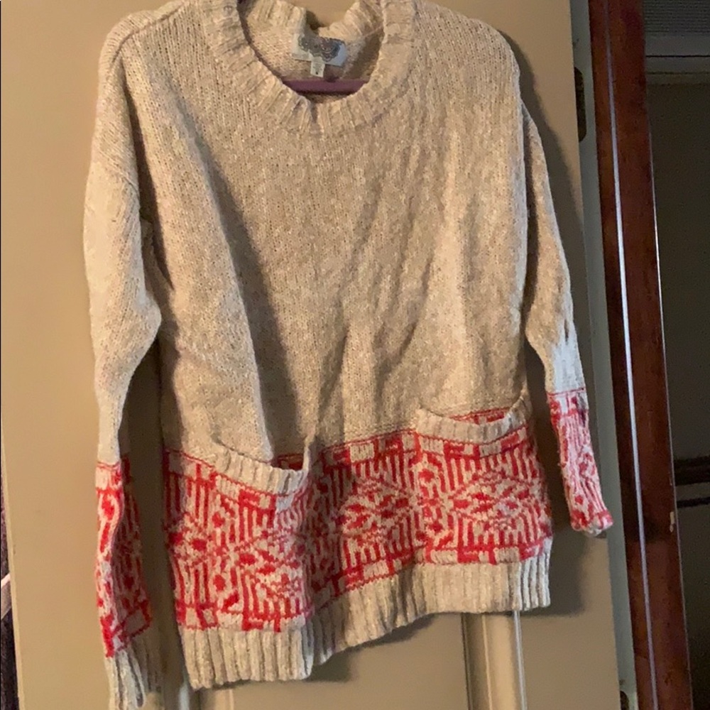 Tan and red sweater